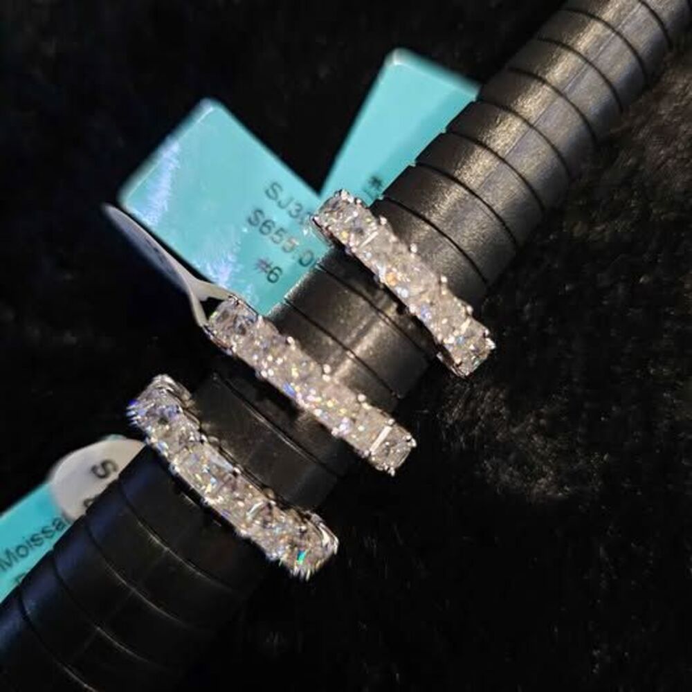 6.3CTW Moissanite Eternity band in .925 Priced as each. Size 6, 7, and 8 avail.
